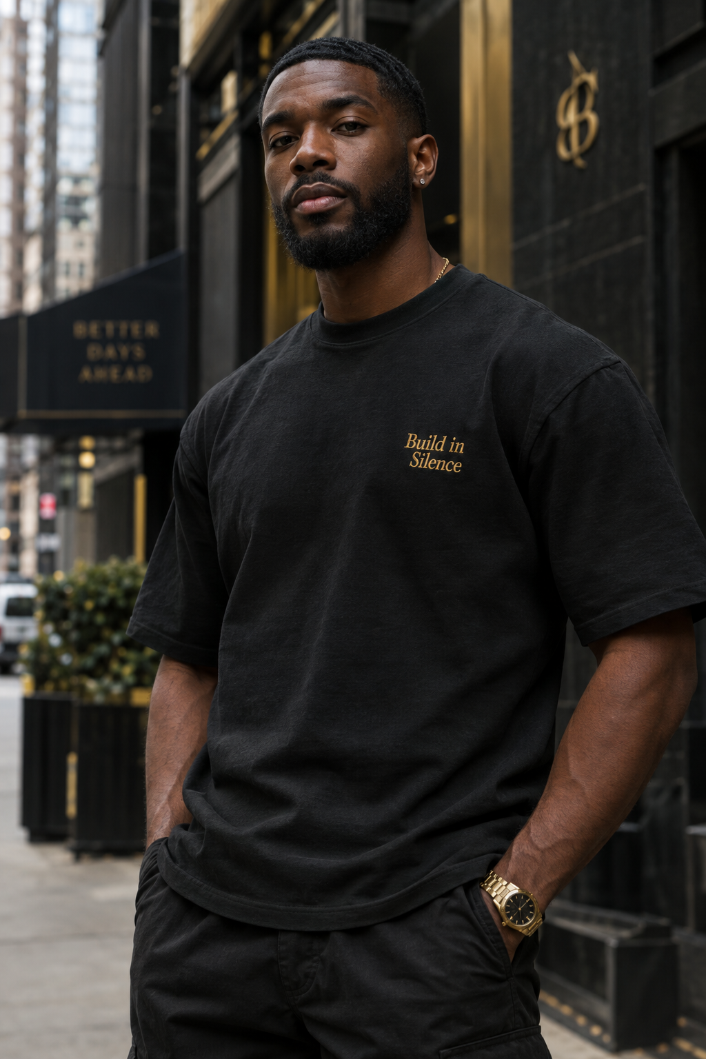 Build in Silence black tee — male urban lifestyle, gold embroidery